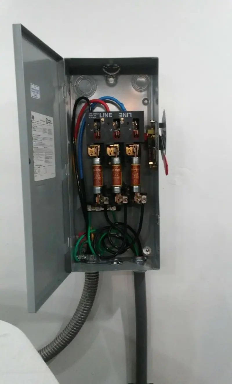 Three-phase disconnect switch installed for Smoke Detector Installation in Ridgewood village